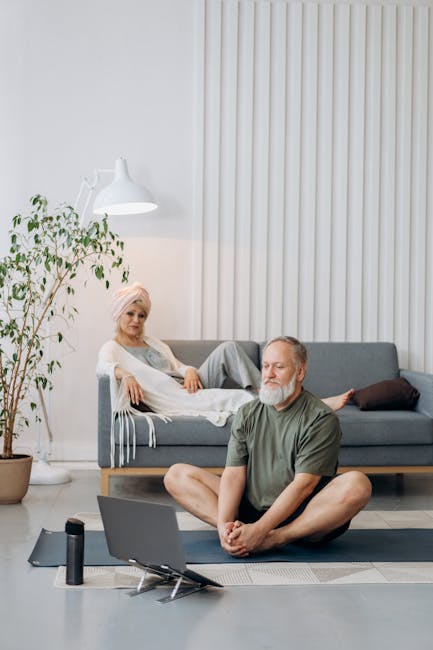 A relaxed person doing a gentle morning stretch in a sunlit modern apartment